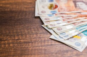 UK bank notes on a table.