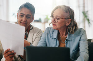 A couple reviewing paperwork together.